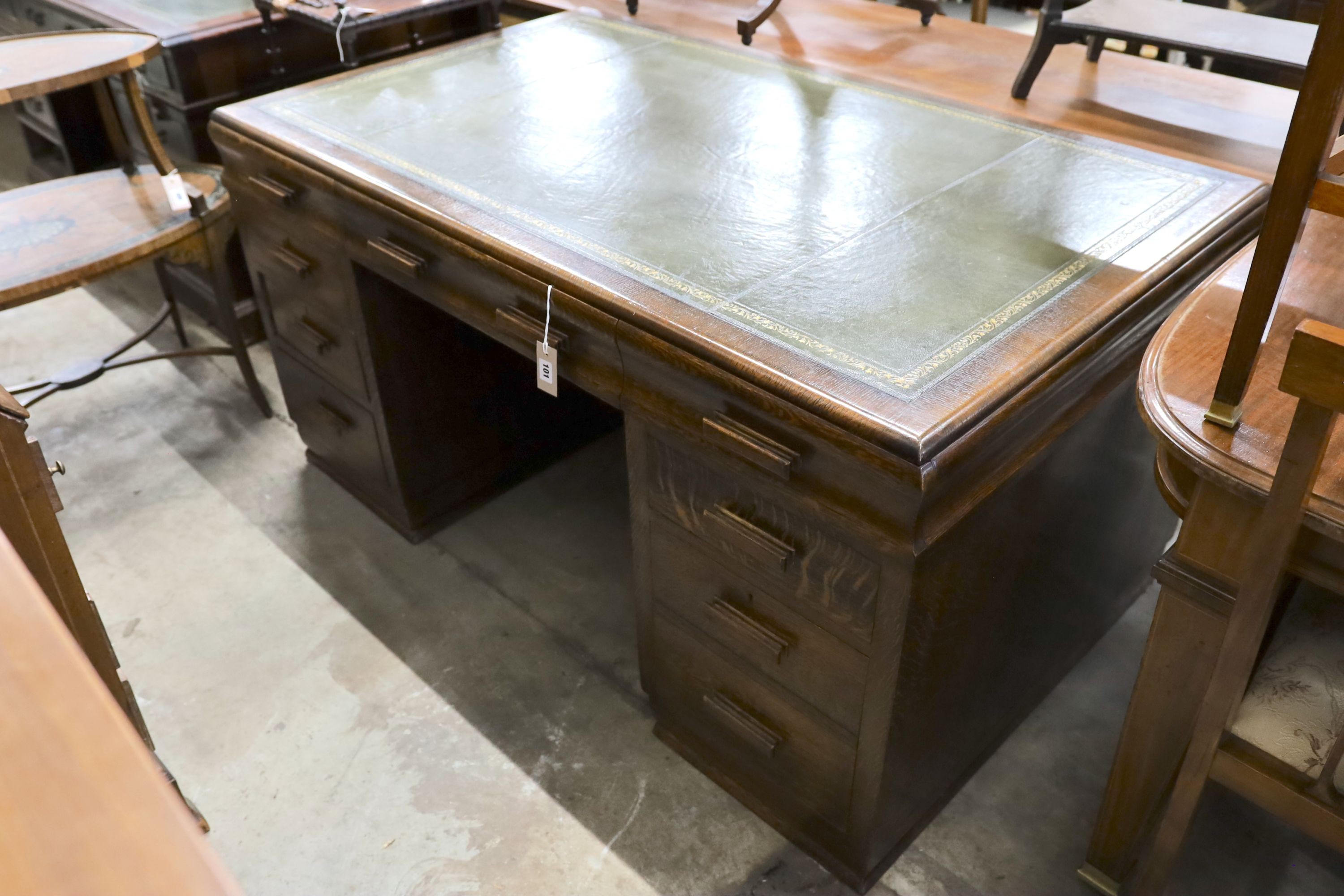 An early 20th century oak pedestal desk, length 152cm, depth 90cm, height 78cm